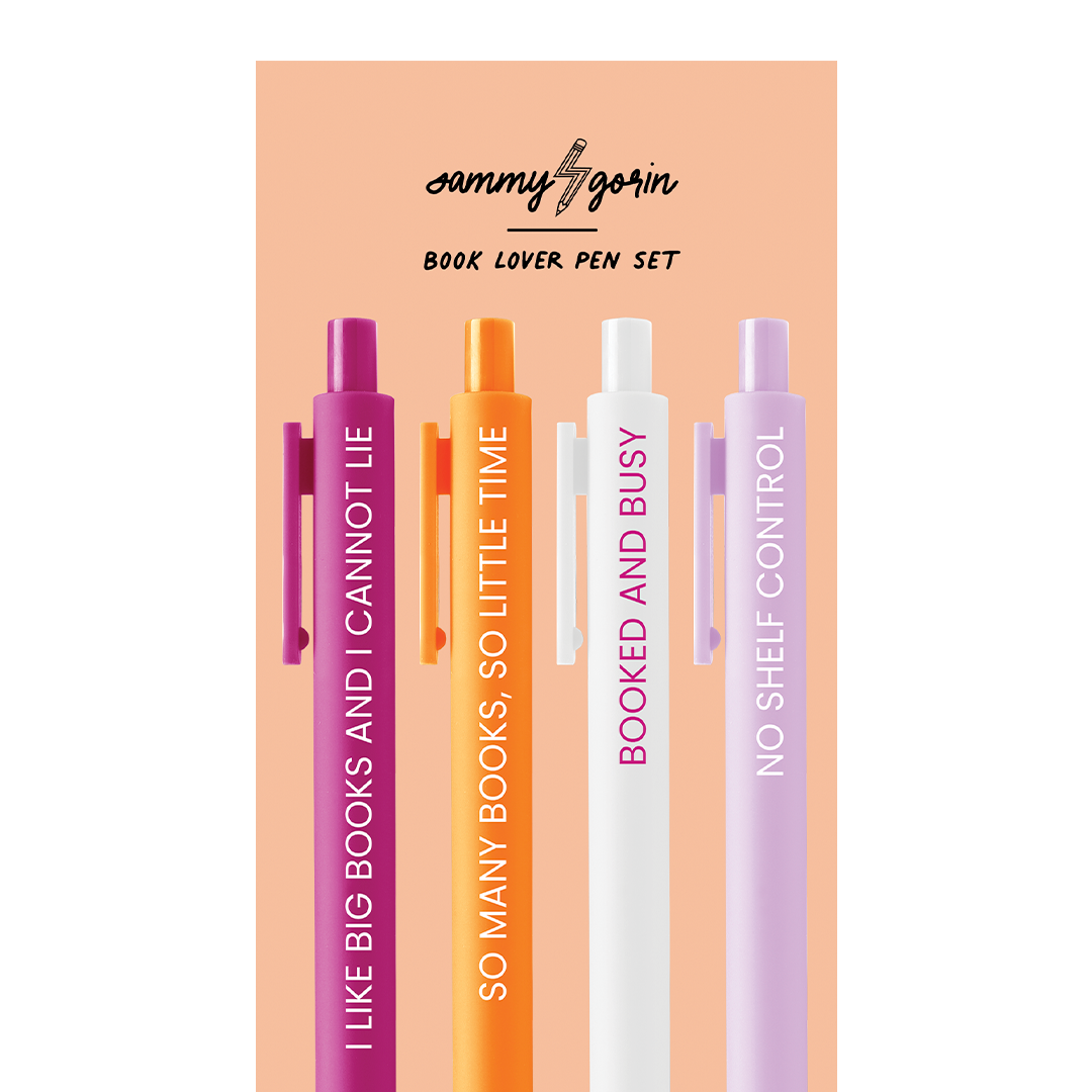 Four pens on peach cardboard backing. The colors of the pens are cherry red, orange, white, and lilac.