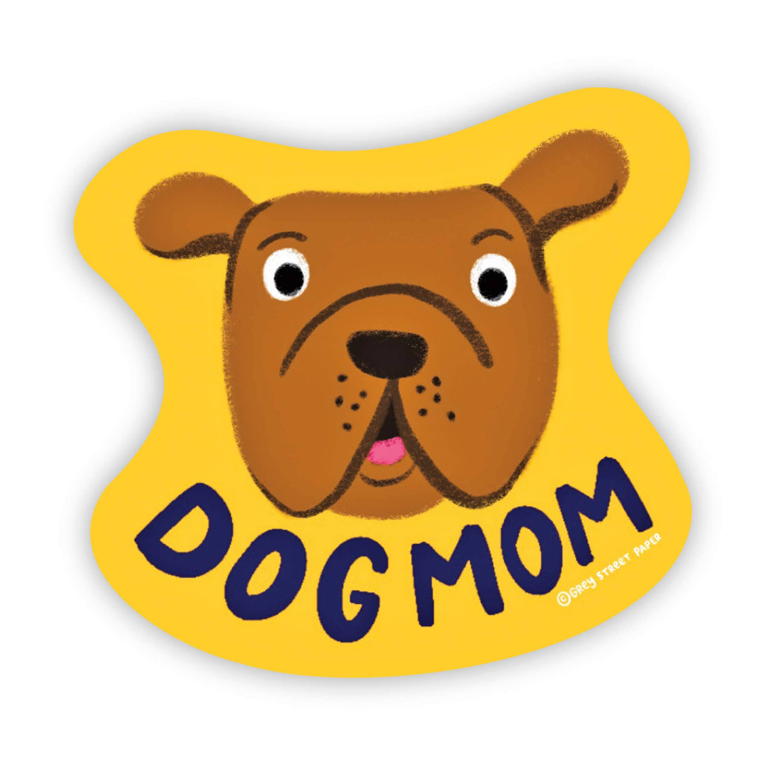 Irregularly shaped yellow sticker with the head of a brown dog and the text 'dog mom.'
