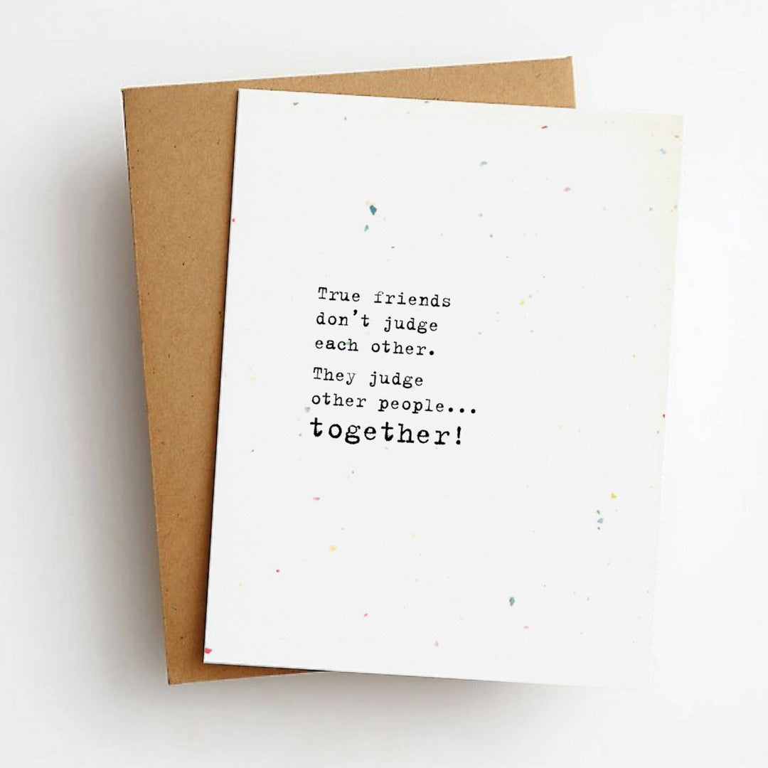 Front of greeting card with humorous friendship quote in black ink on a white background.