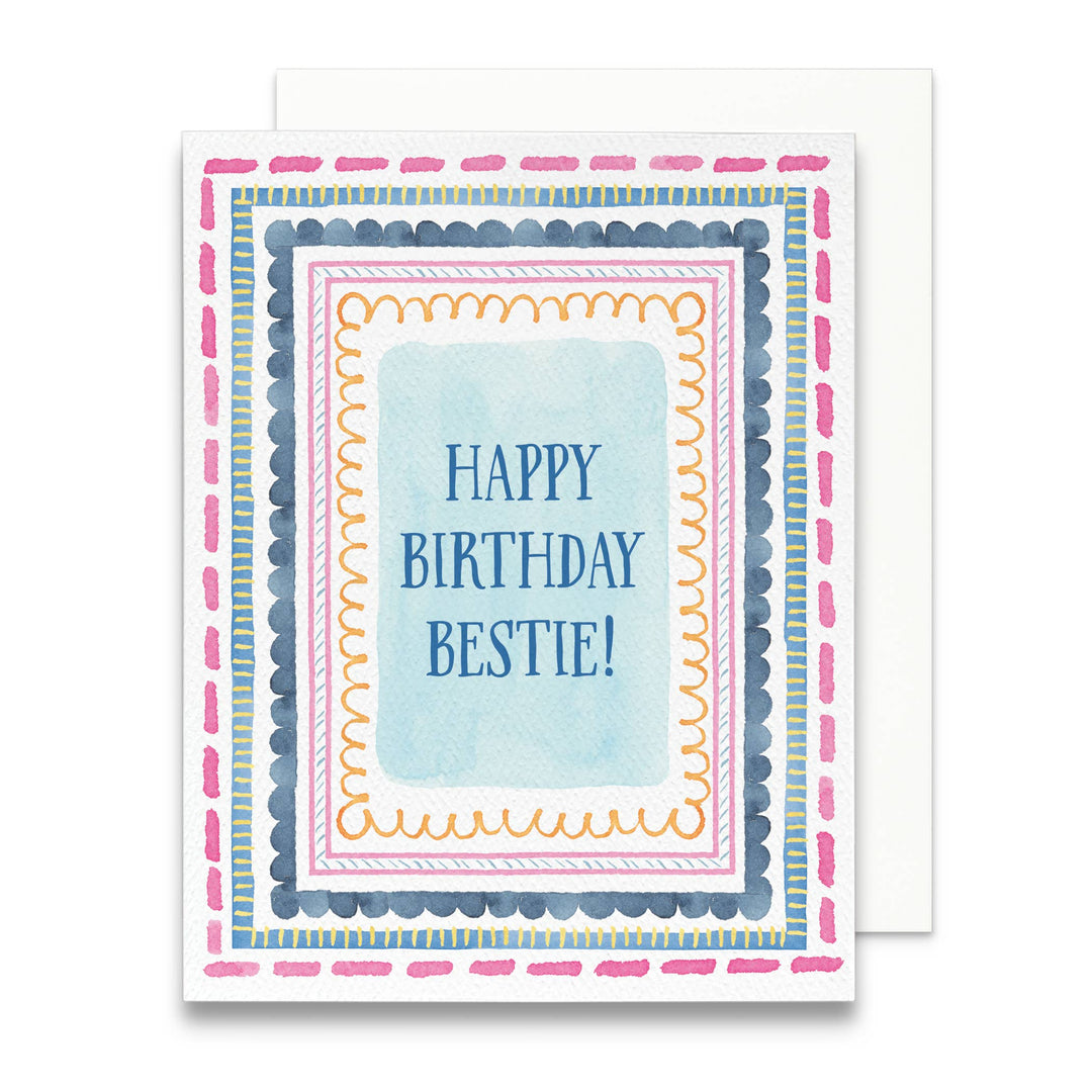 Front of card with colorful border of concentric rectangles in pinks, blues and yellows, with the text 'happy birthday bestie' in the center.