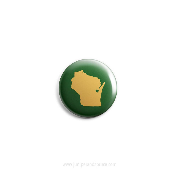 Round magnet  with yellow outline of Wisconsin on a green background.
