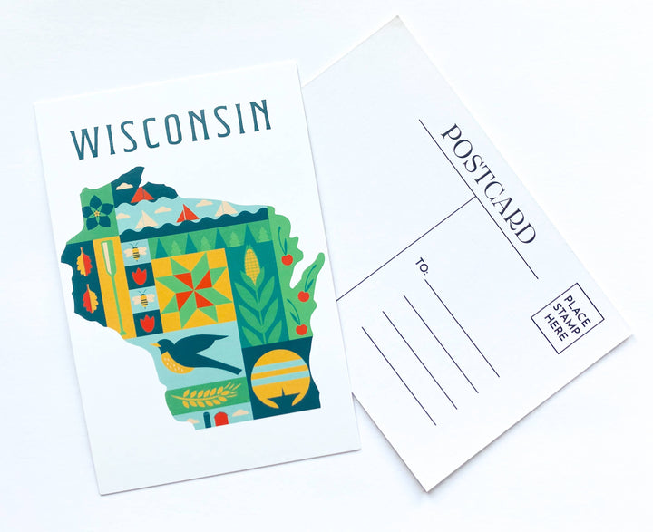 Front of postcard overlapping the back with space for writing and lines for the address.