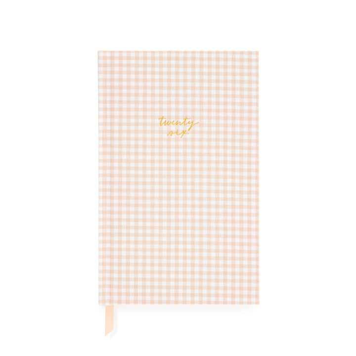 Pink gingham notebook with 'twenty six' in gold