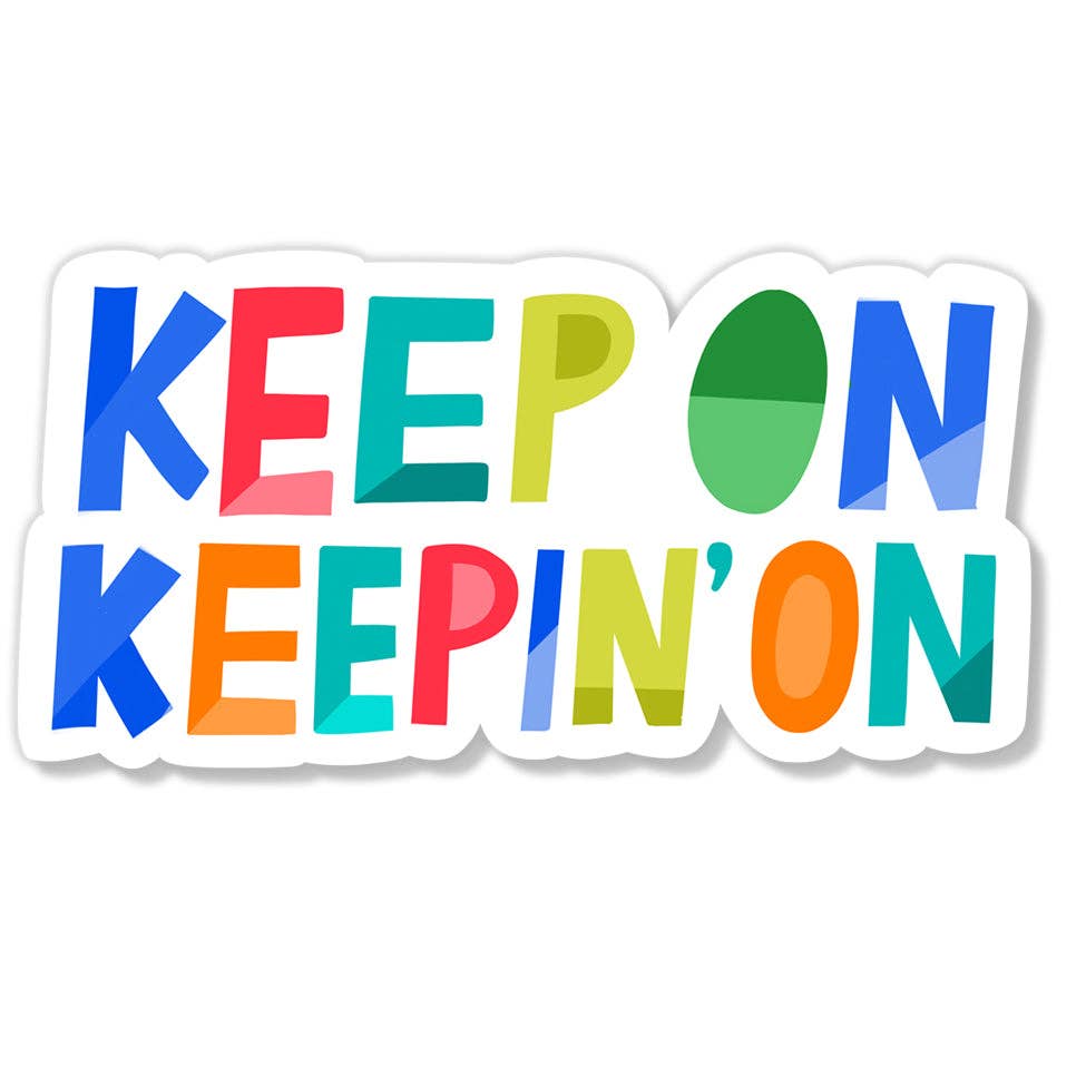 A die-cut vinyl sticker featuring the motivational phrase 'KEEP ON KEEPIN' ON' in colorful, geometric block letters on a white background.
