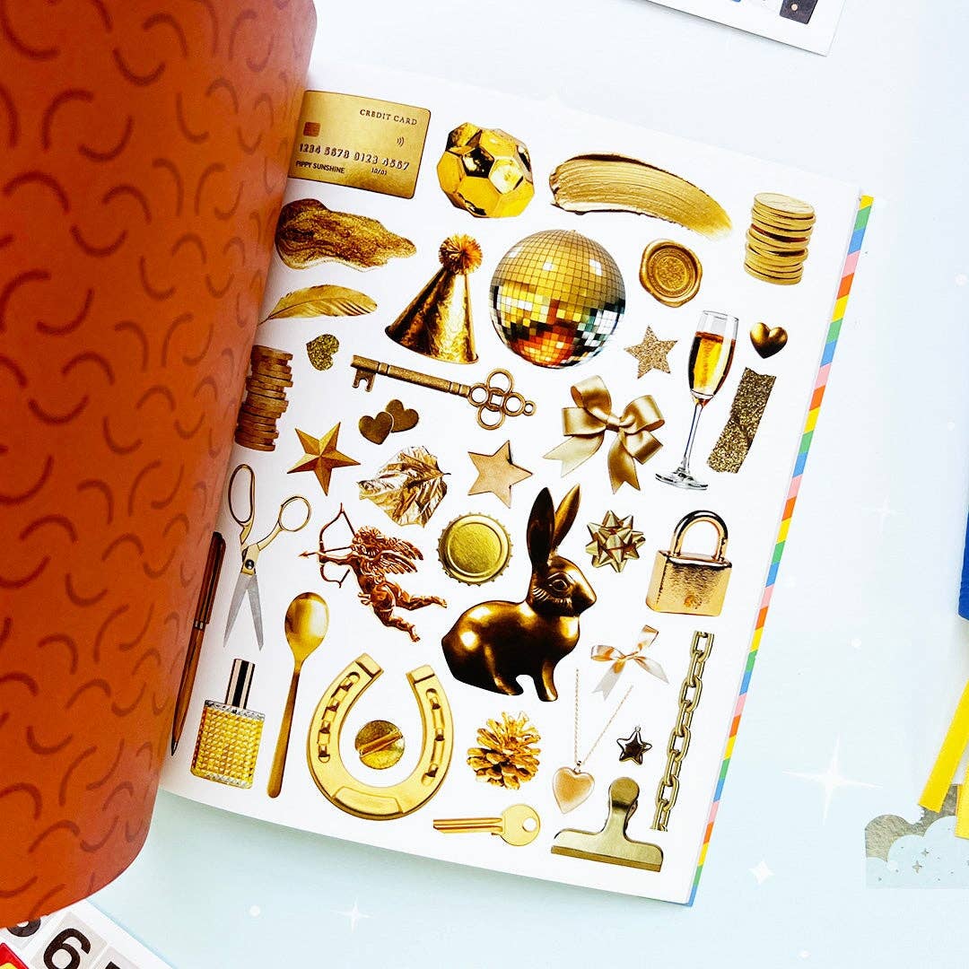 Page of various objects in gold, including a key, a horseshoe and a spoon.