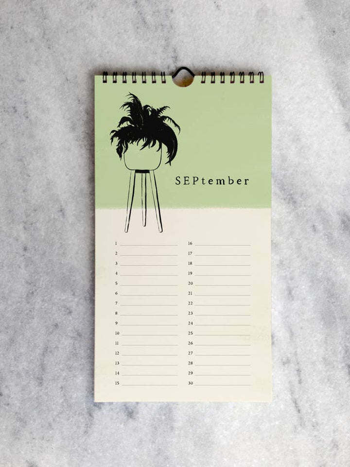 The page for September with a drawing of a potted plant on a light green background above a line for each day in the month.
