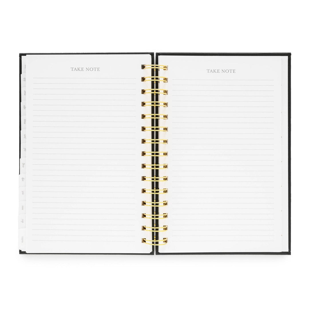 Planner opened to pages for recording notes.