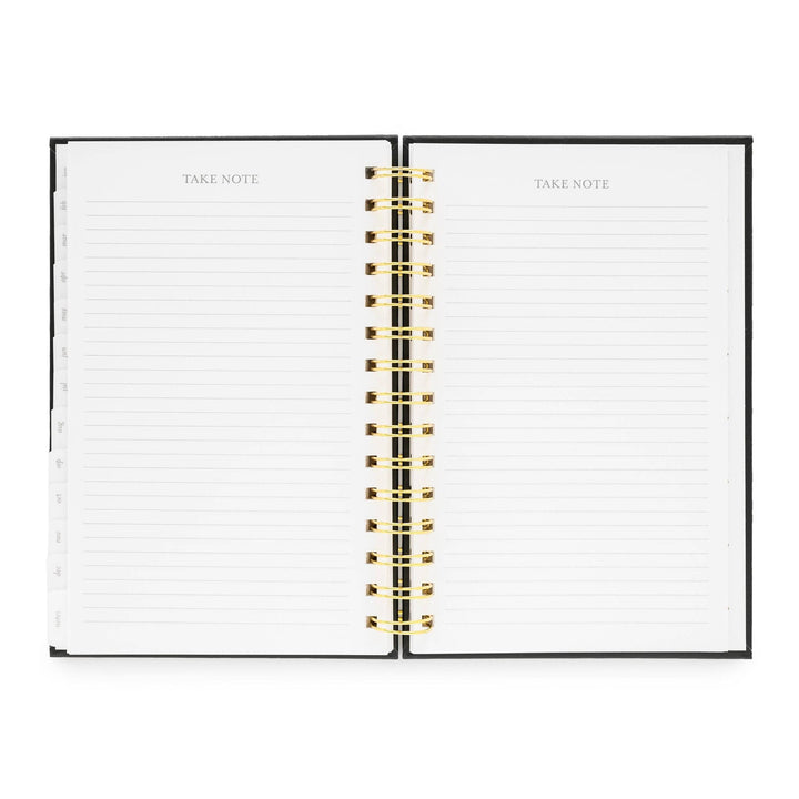Planner opened to pages for recording notes.