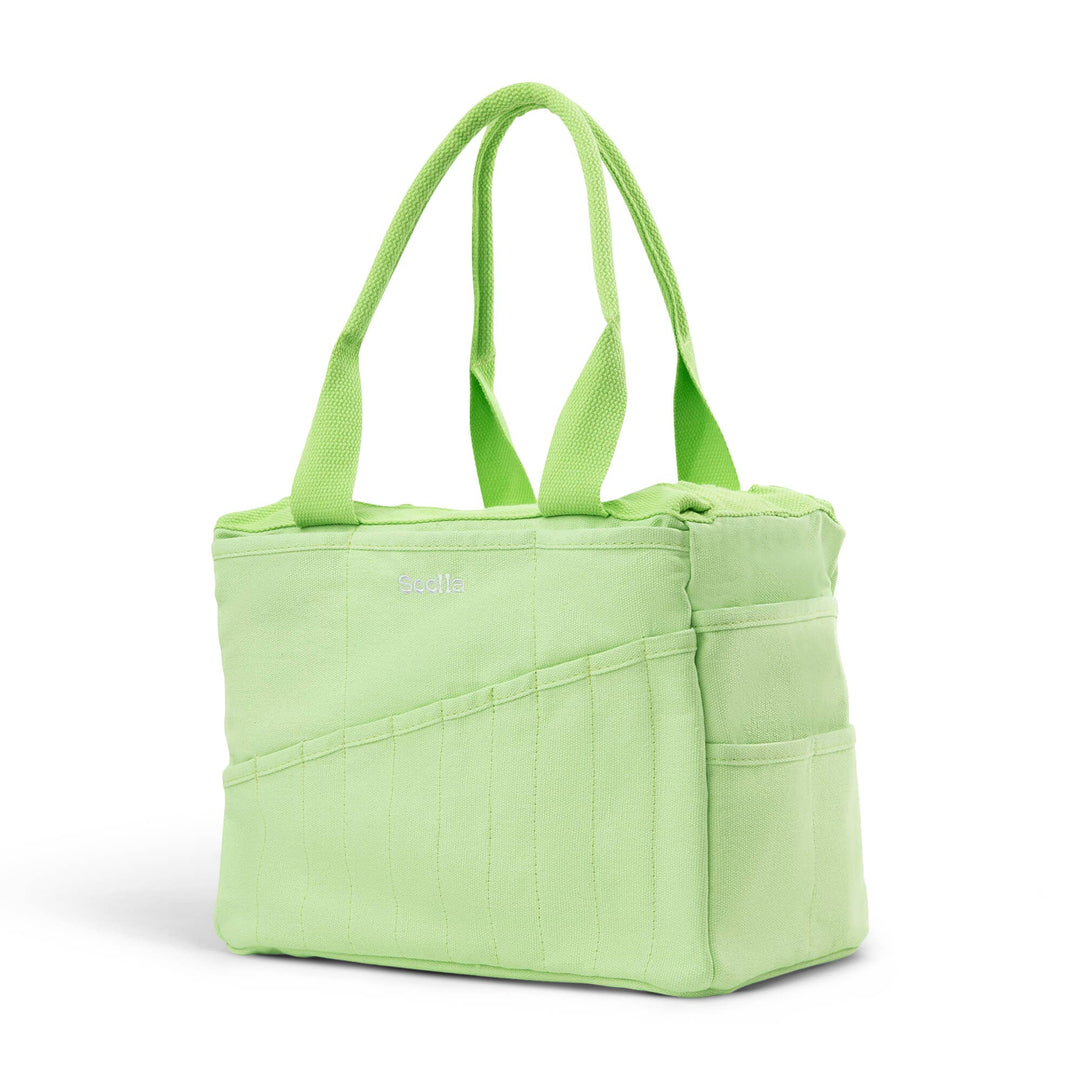 Lime studio bag at an angle, with 10 narrow pockets on the long side and two wider pockets on the end side. 