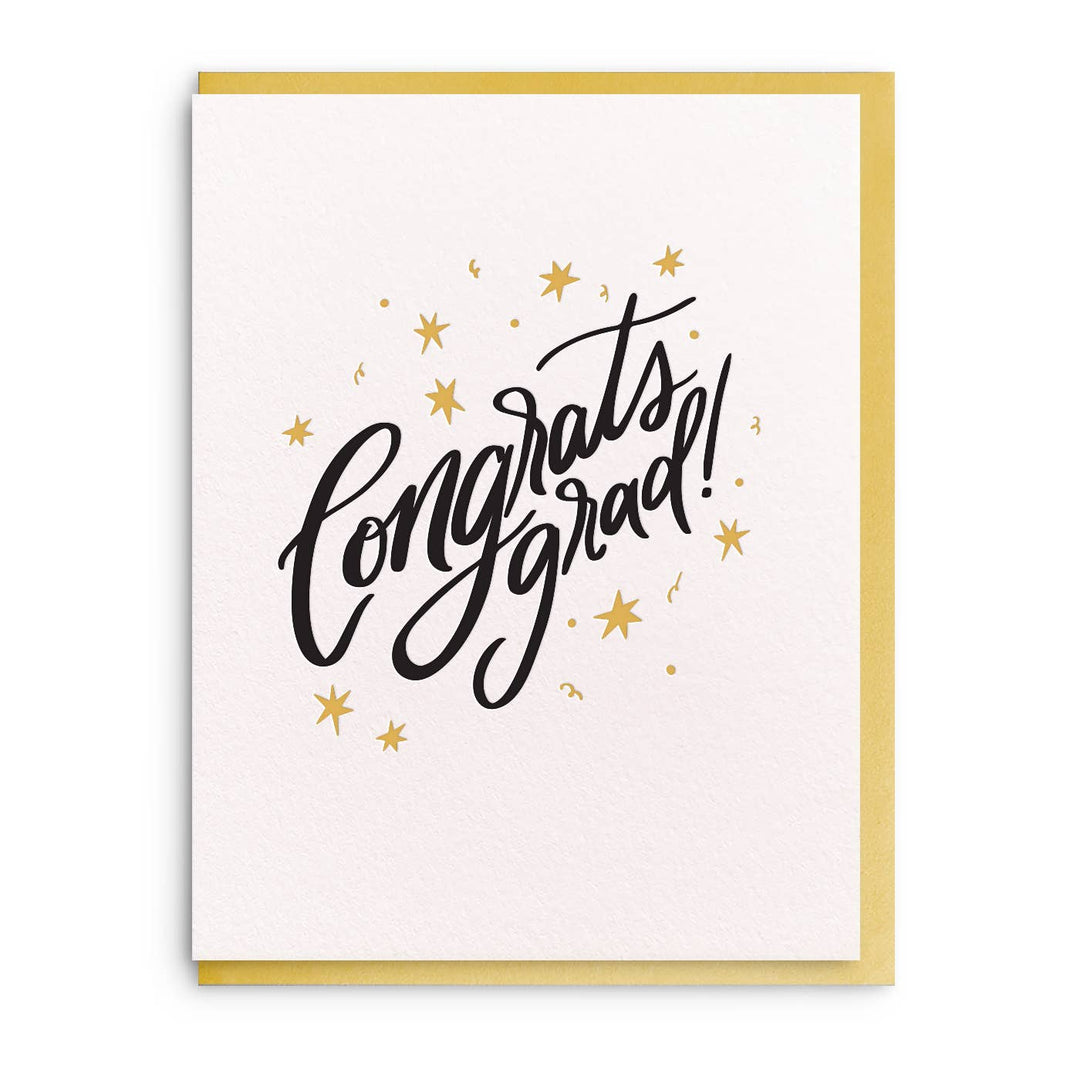 Black cursive text with gold stars and squiggles on a white background