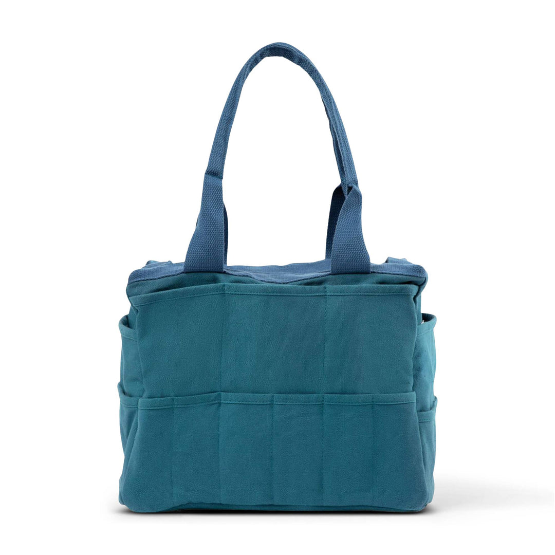 Back side of bag (shown here in aquamarine) with six medium width pockets .
