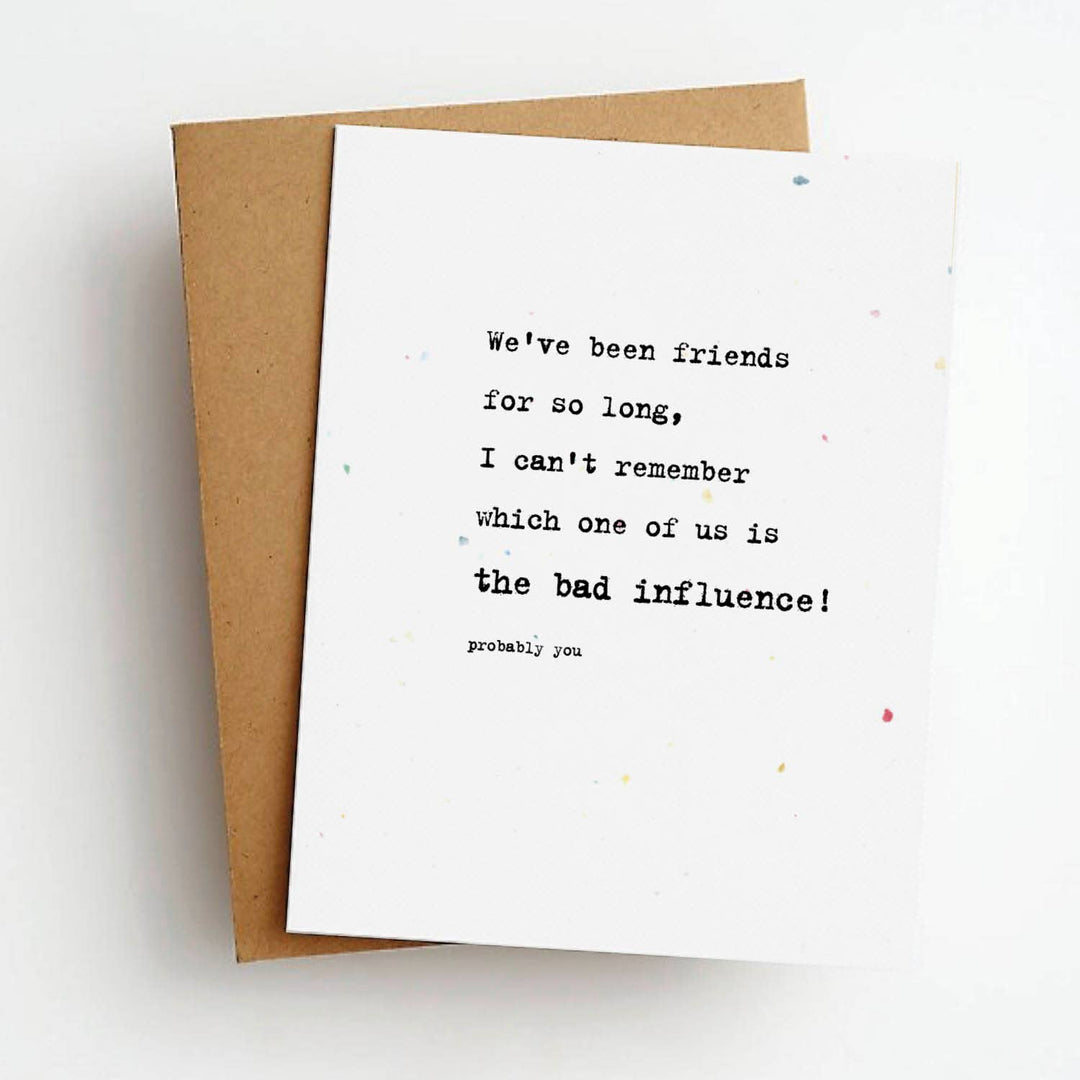 Front of greeting card with humorous text in black ink on a white background.