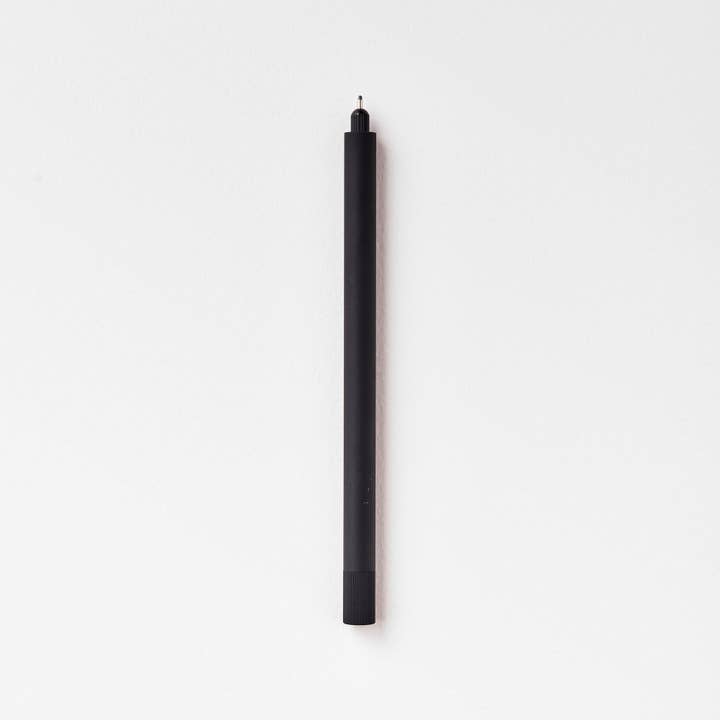Black fineline pen with cap removed.