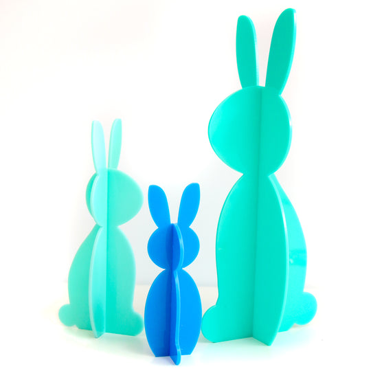 Three 3D acrylic rabbits in 3 sizes.