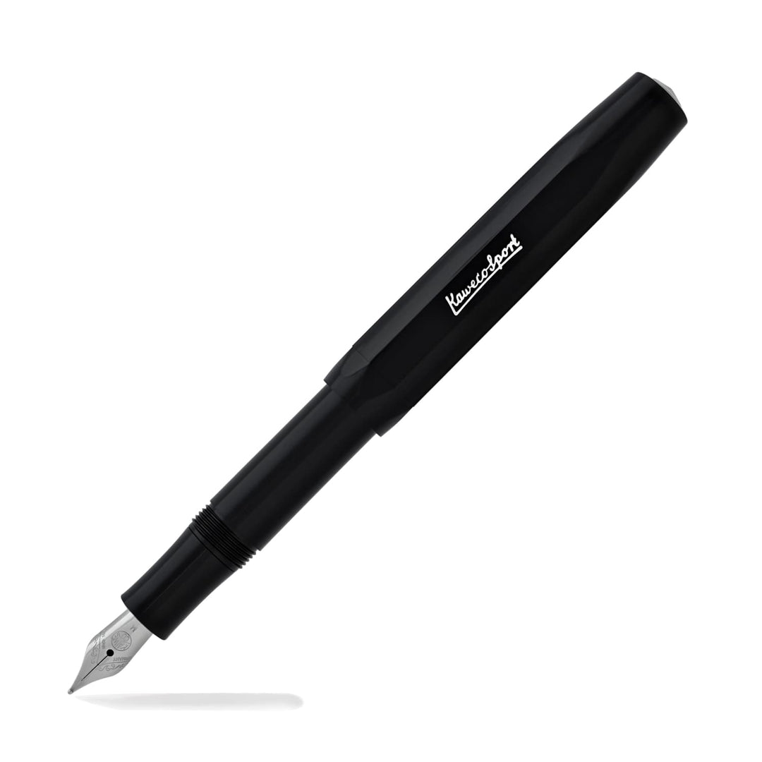 Black skyline fountain pen with silver nib and branding, with cap placed on pen end.