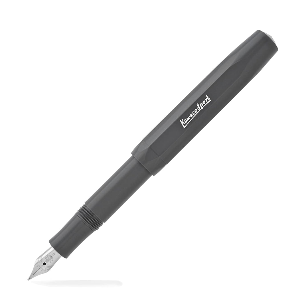Grey skyline fountain pen with silver nib and branding, with cap placed on pen end.