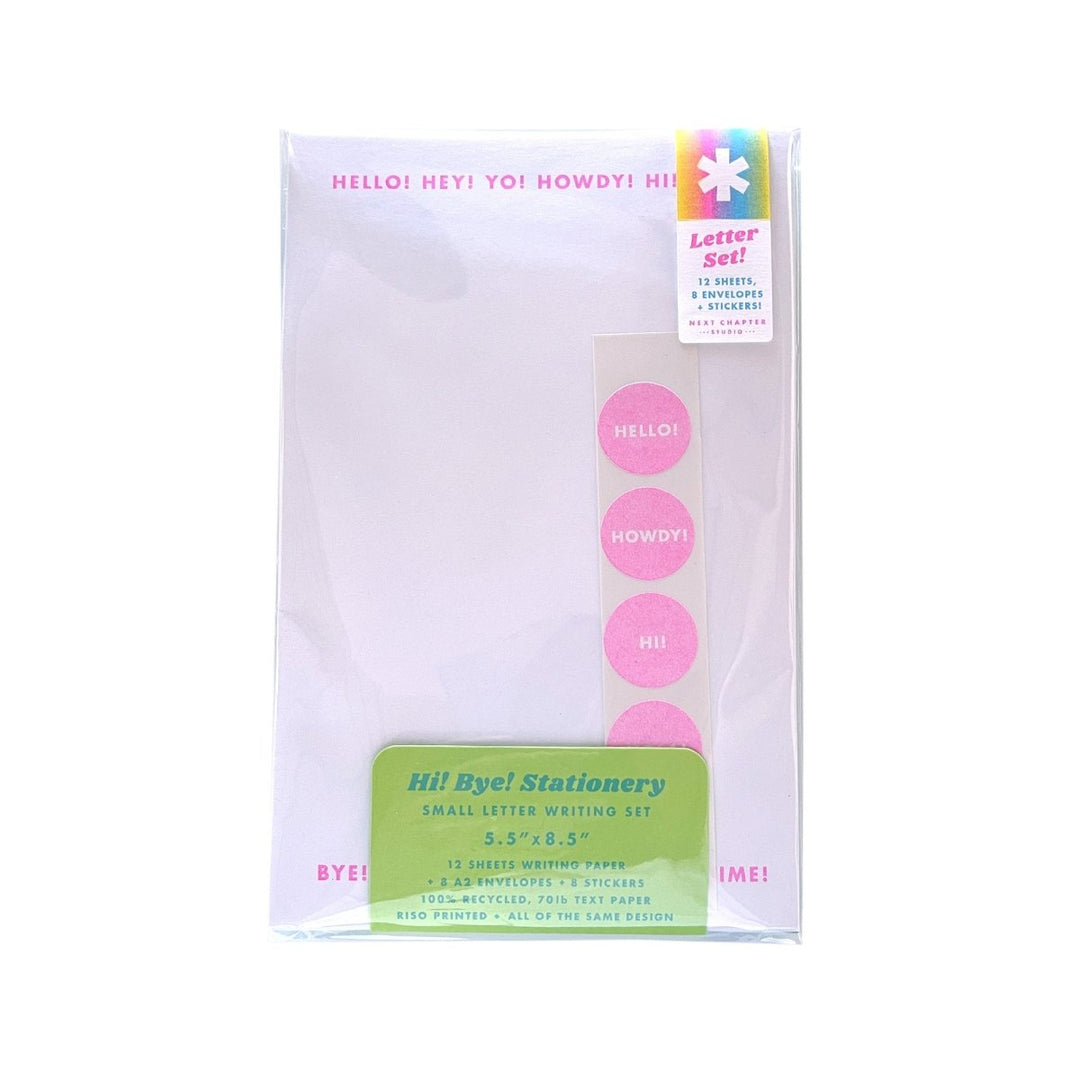 Package of stationery with various ways to say "hello" across the top and ways to say "goodbye" across the bottom, and a strip of round stickers.