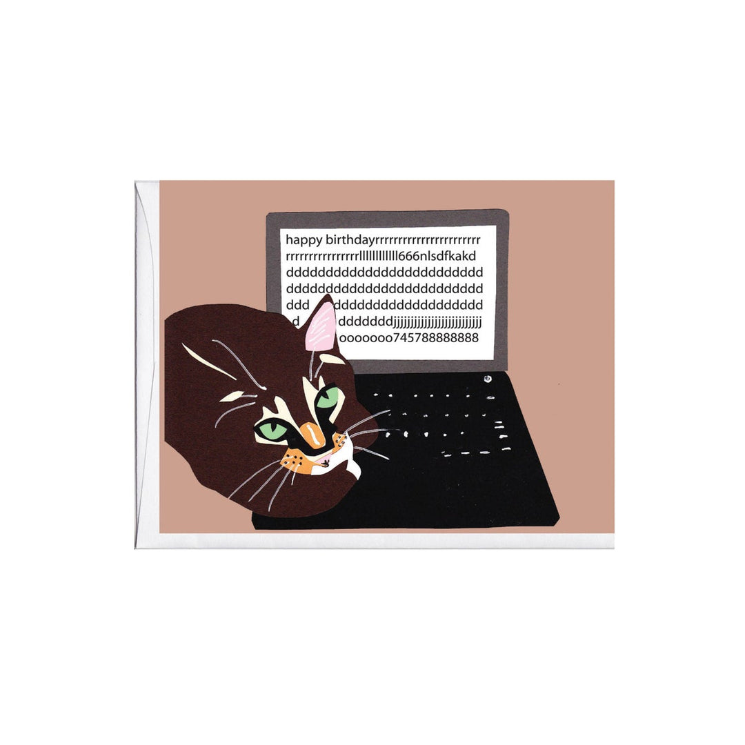 A birthday card featuring an illustration of a cat with a birthday candle on its head, sitting in front of a laptop with 'Happy Birthday' text on the screen.