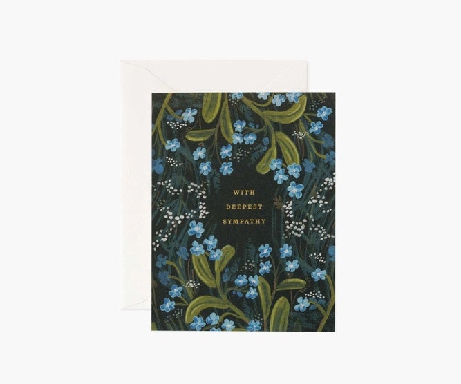 Dark card with foliage and dark green text