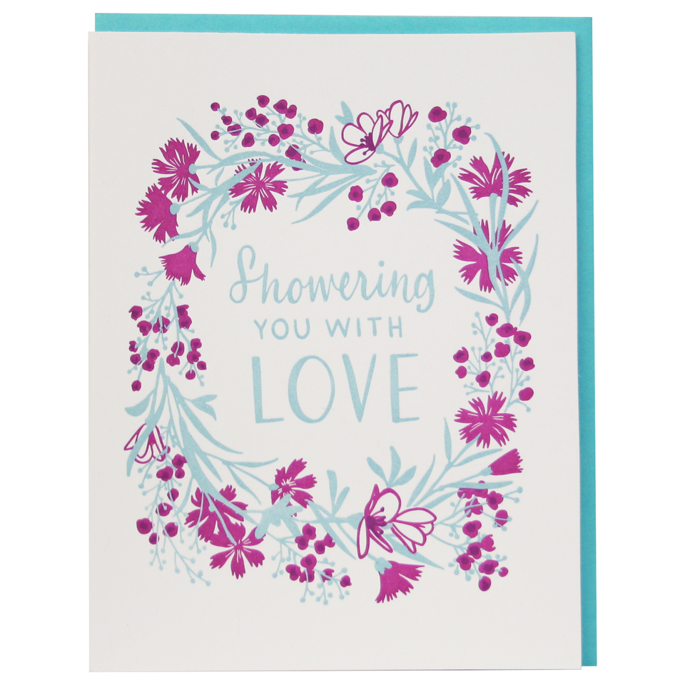 Greeting card with floral wreath around the text Showering you with love.