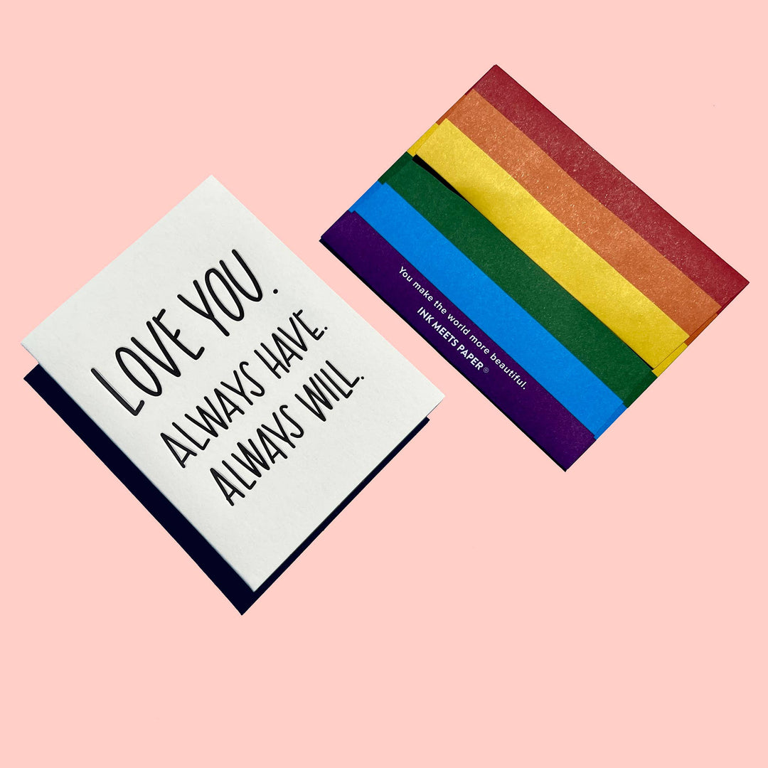 Greeting card reading LOVE YOU. ALWAYS HAVE. ALWAYS WILL and rainbow striped envelpe with slogan for INK MEETS PAPER